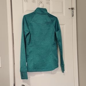 Teal colored Mondetta zippered jacket with zippered pockets